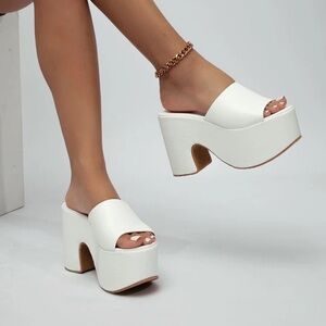 White leather platforms